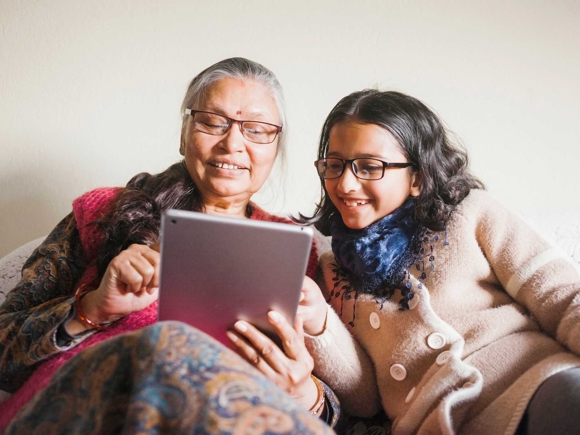 Two people browsing Zoopla on a tablet